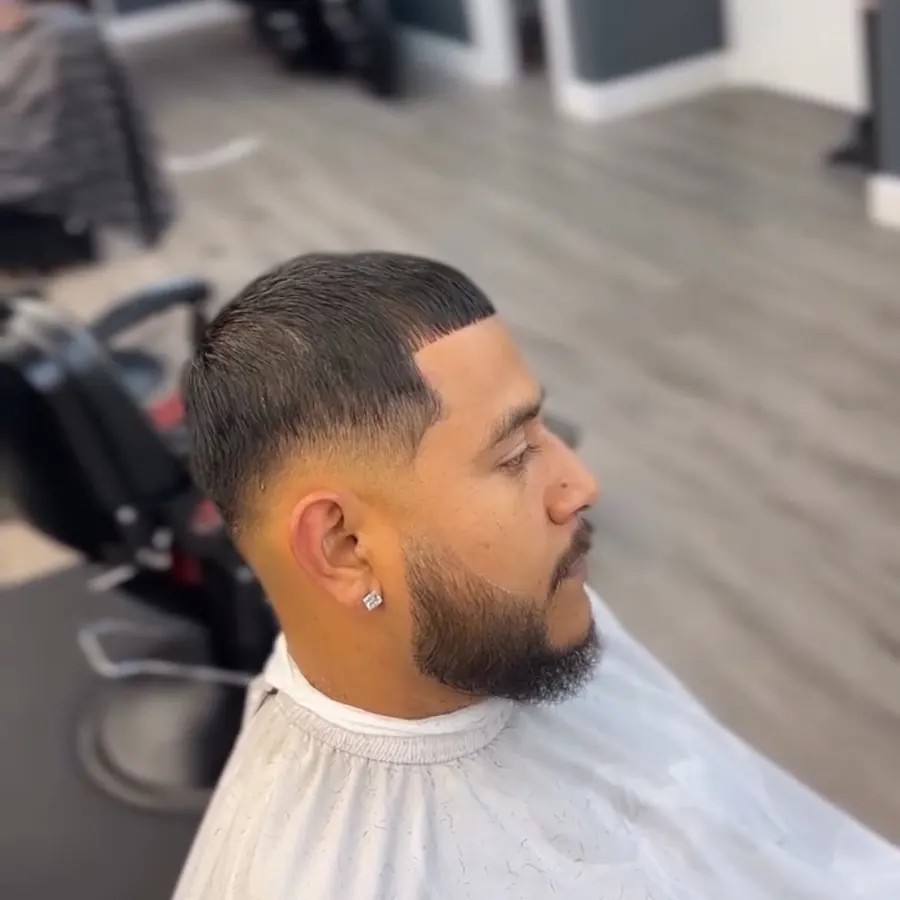 Mid fade with the beard lined up