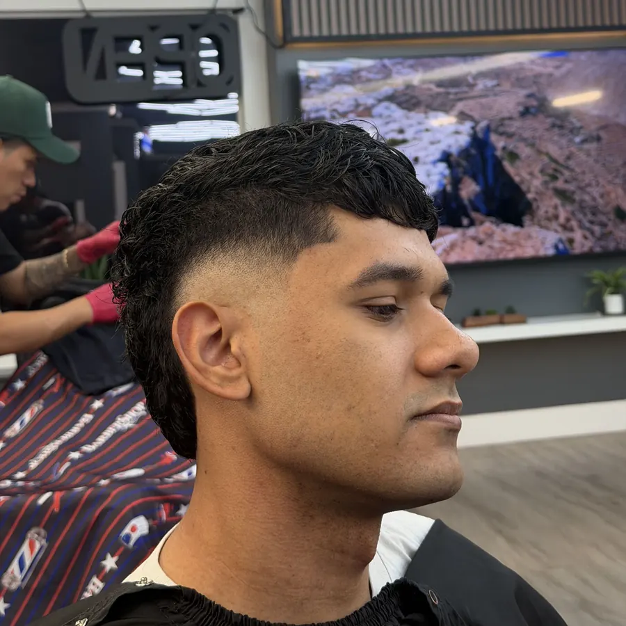 Burst fade mullet with curls